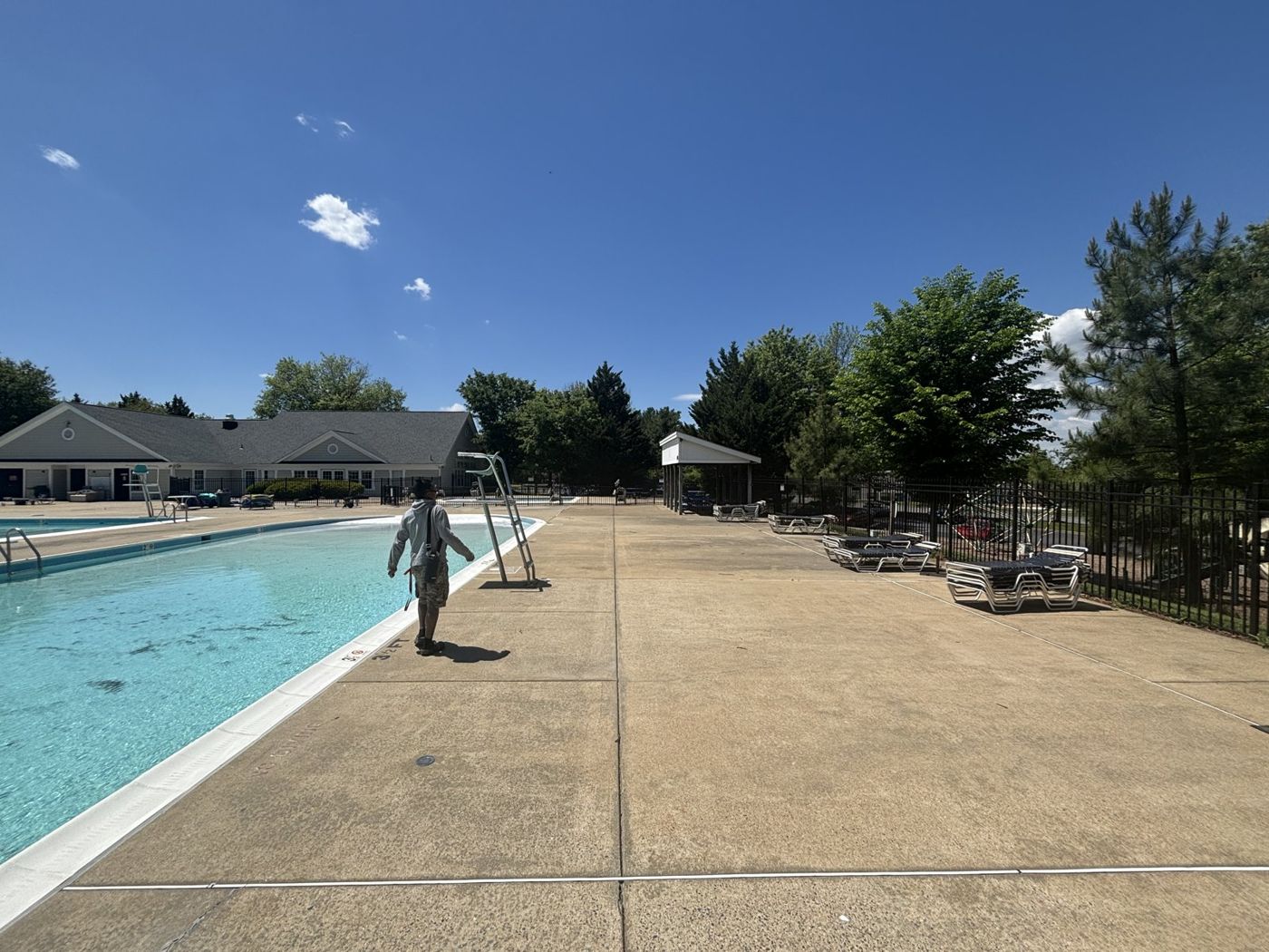 Huge community pool and deck before cleaning