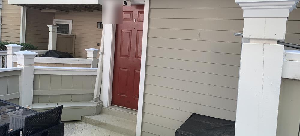 Townhome siding and entry after power washing